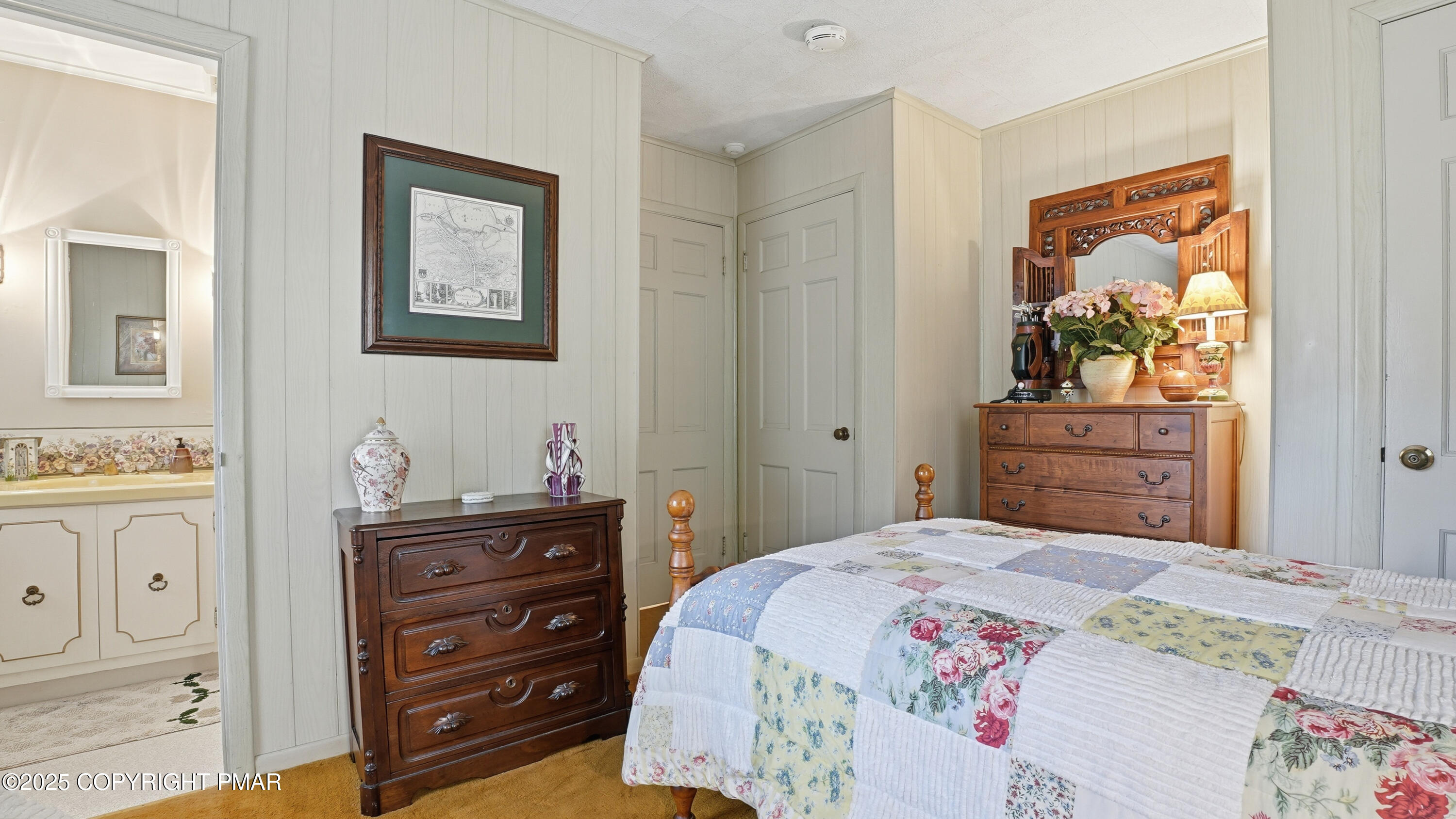 519 Pheasant Lane Cresco, PA 18326 - Photo 32 of 79 a bedroom with a bed and a dresser