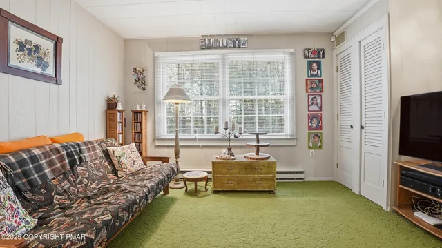 a bedroom with a bed and furniture