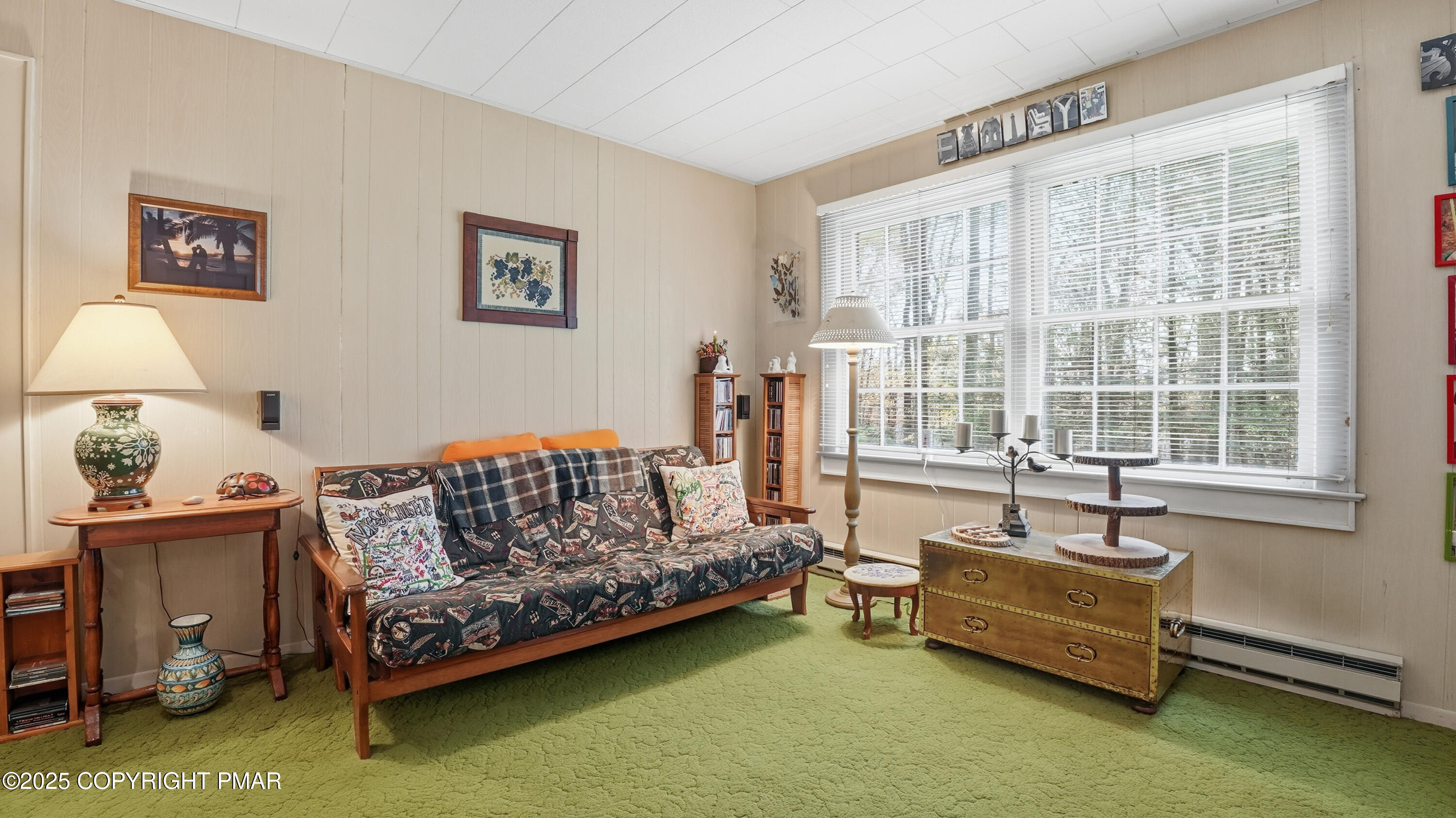 519 Pheasant Lane Cresco, PA 18326 - Photo 39 of 79 a living room with furniture and a window