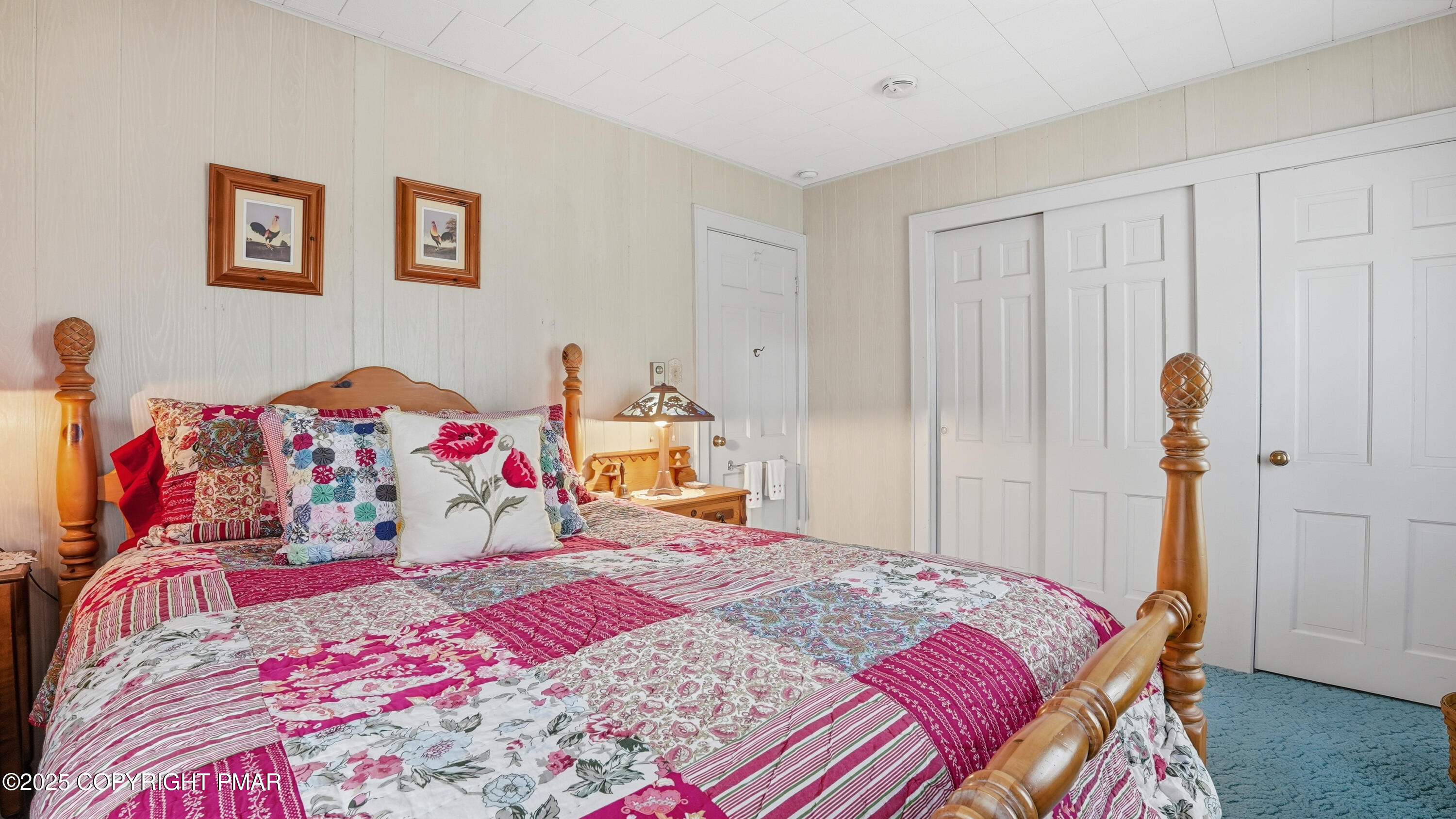 519 Pheasant Lane Cresco, PA 18326 - Photo 44 of 79 a bedroom with a bed and a painting on the wall