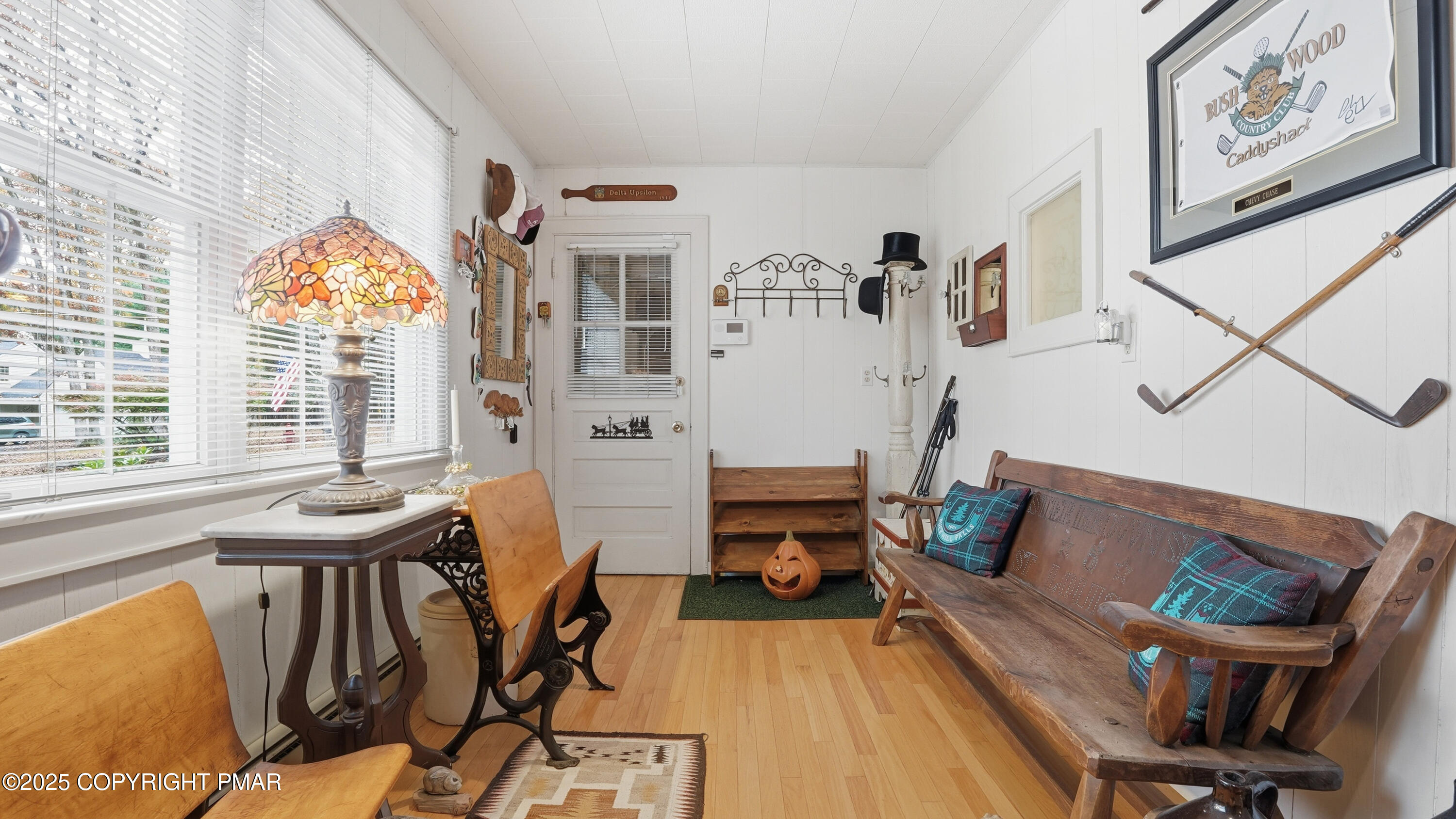 519 Pheasant Lane Cresco, PA 18326 - Photo 48 of 79 a view of a dining room with furniture a chandelier and wooden floor