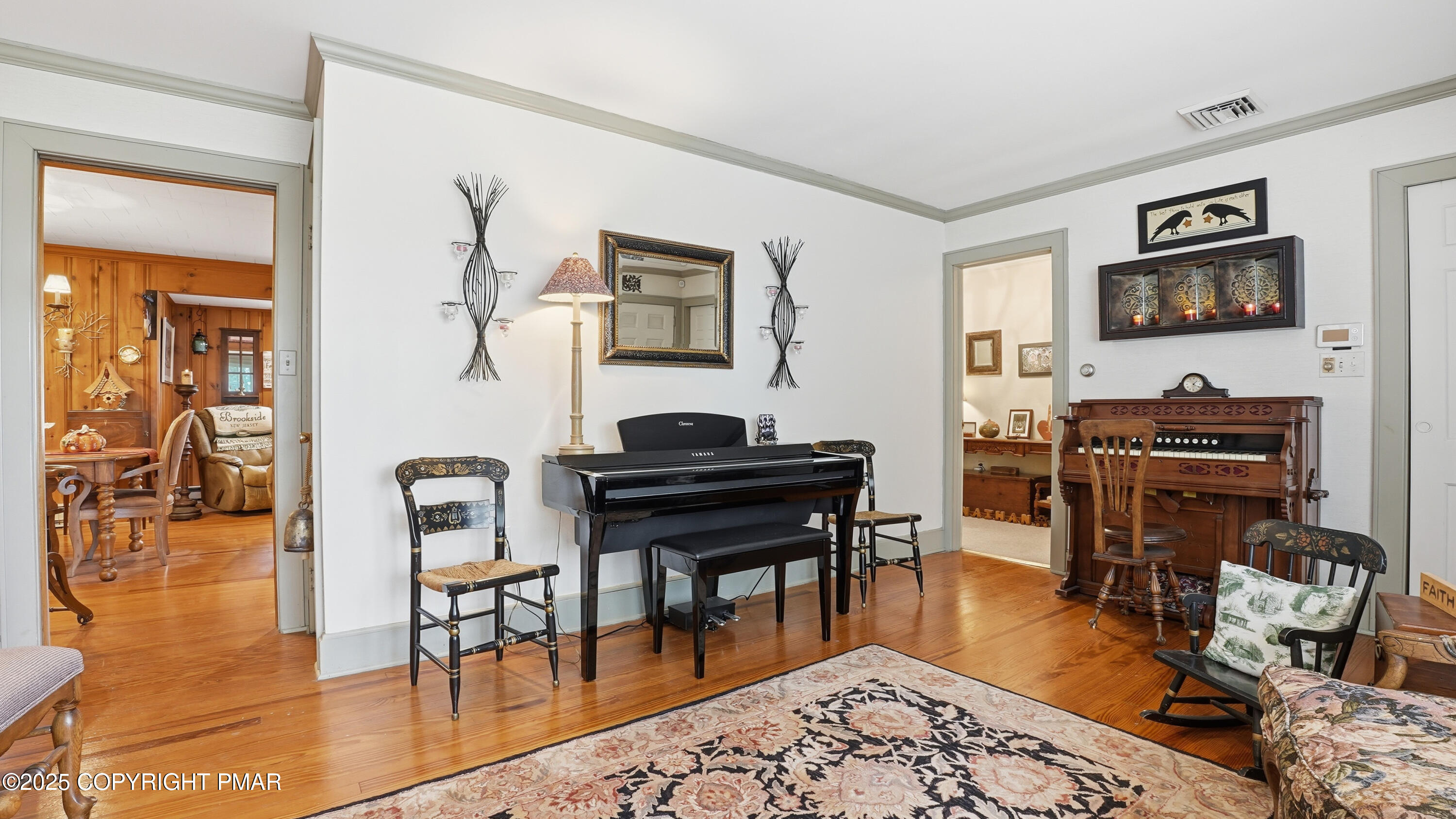 519 Pheasant Lane Cresco, PA 18326 - Photo 7 of 79 a living room with furniture and a wooden floor