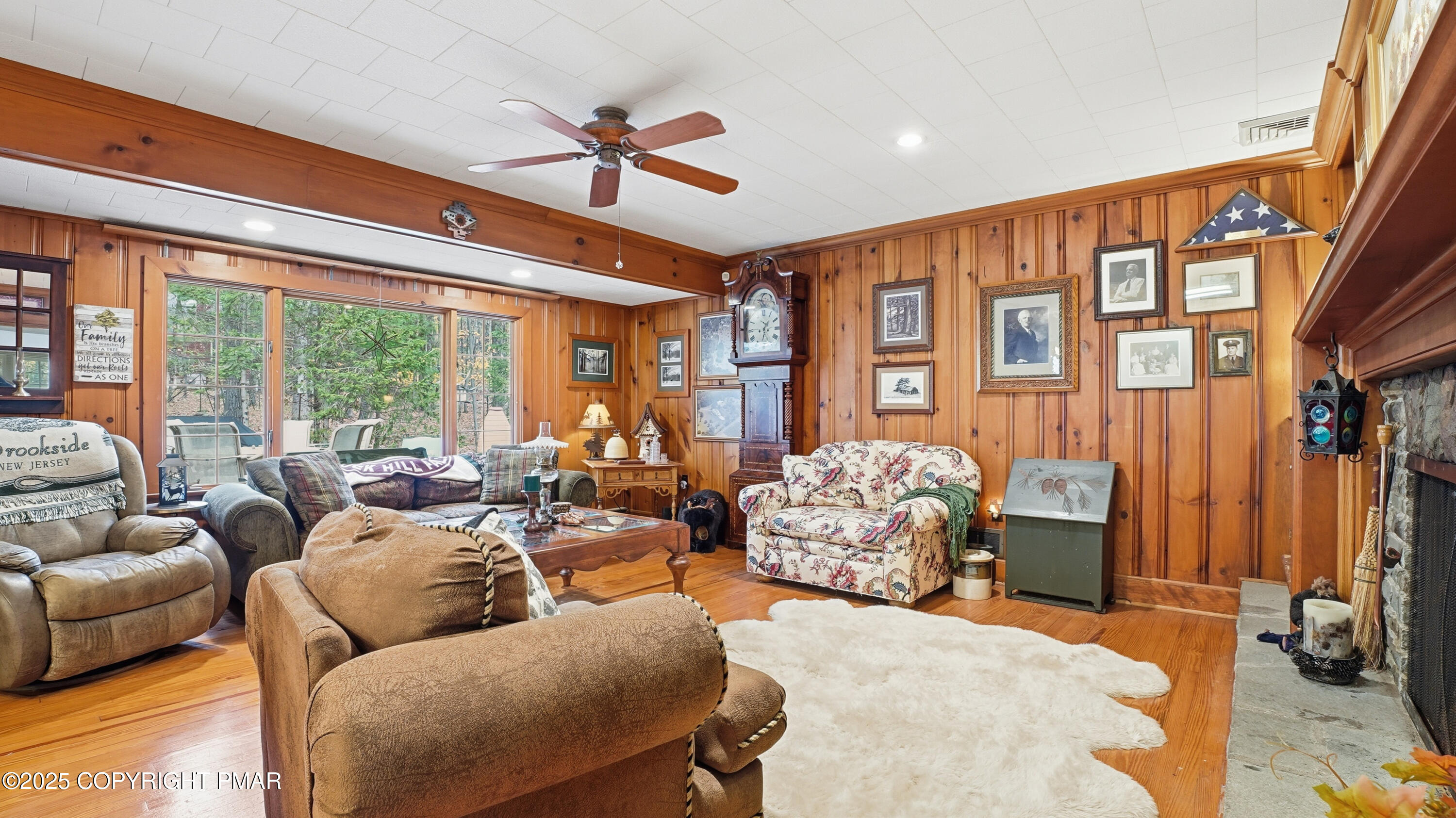 519 Pheasant Lane Cresco, PA 18326 - Photo 8 of 79 a living room with furniture and a large window