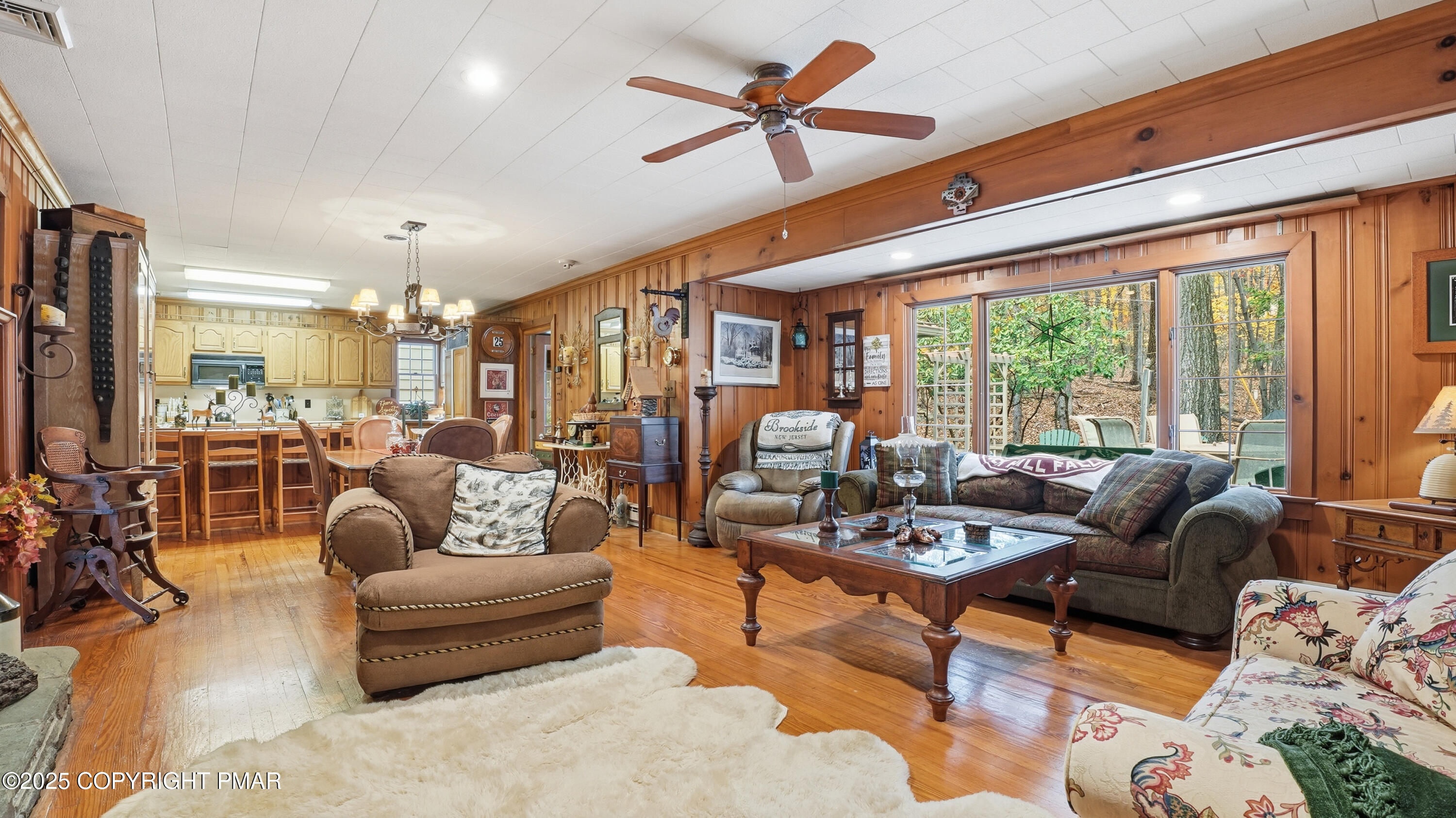 519 Pheasant Lane Cresco, PA 18326 - Photo 9 of 79 a living room with furniture and a large window