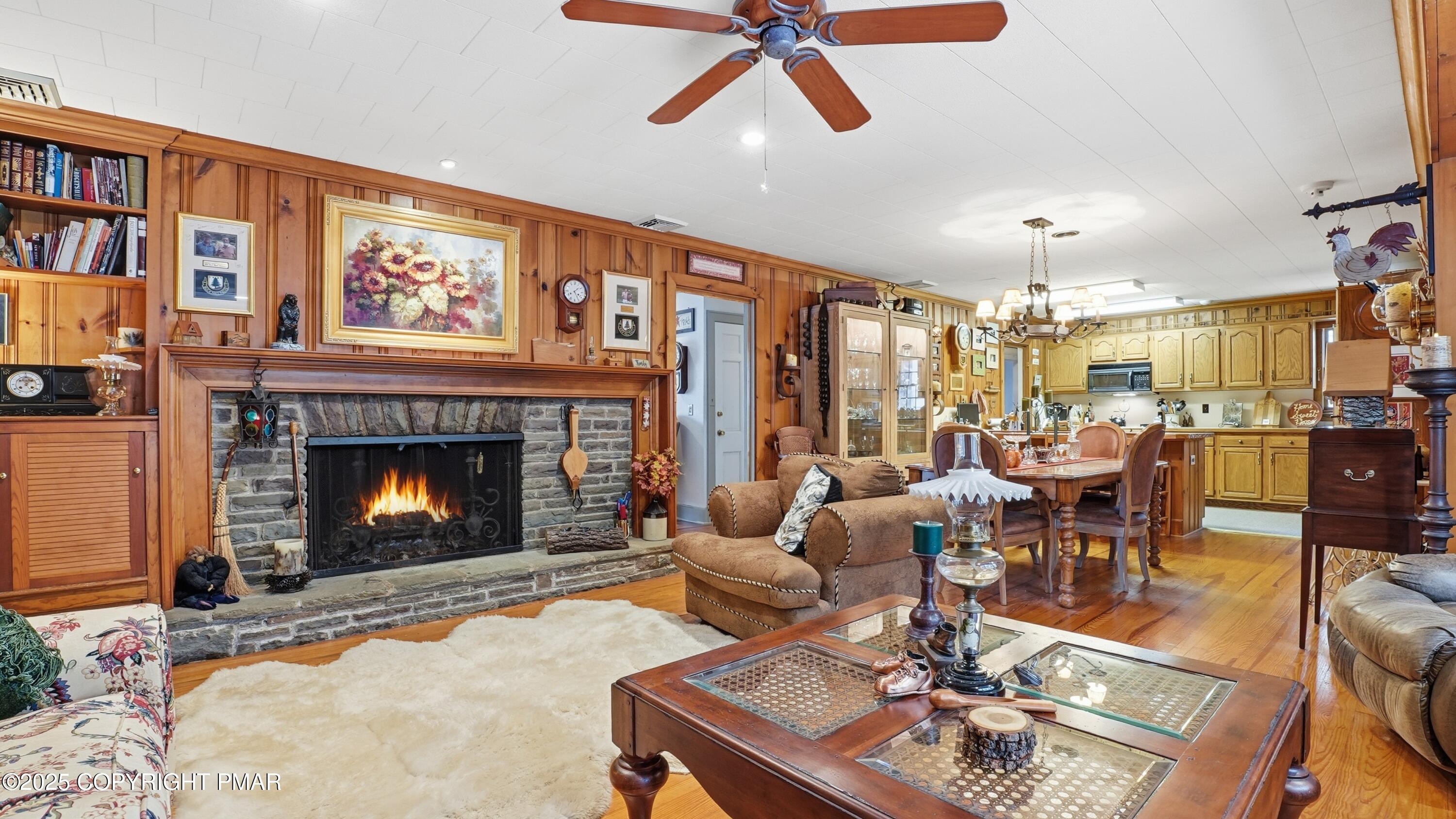 519 Pheasant Lane Cresco, PA 18326 - Photo 10 of 79 a living room with furniture and a fireplace