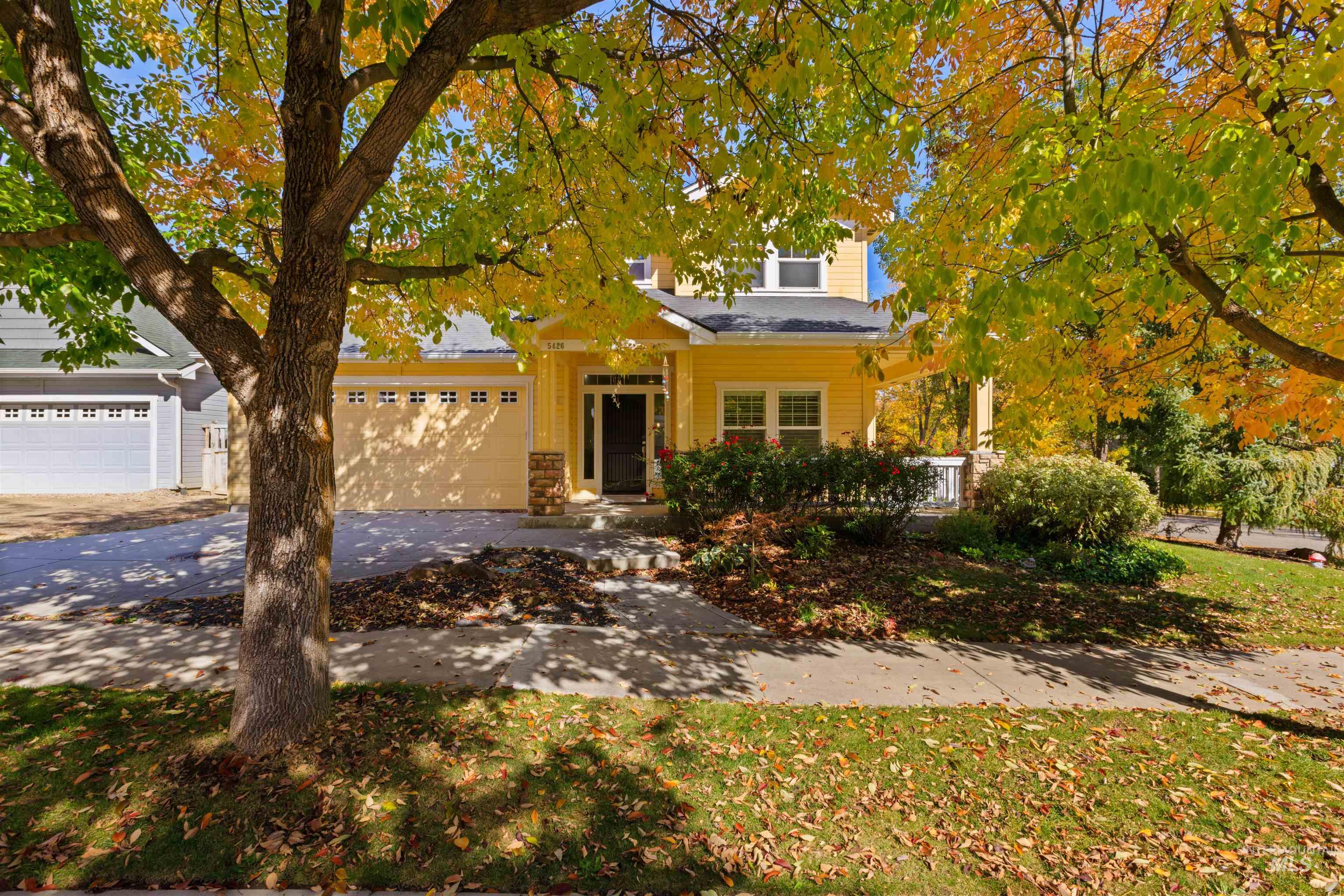 Bright yellow exterior with white trim