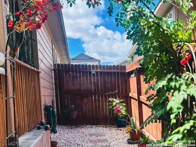 a view of a wooden fence