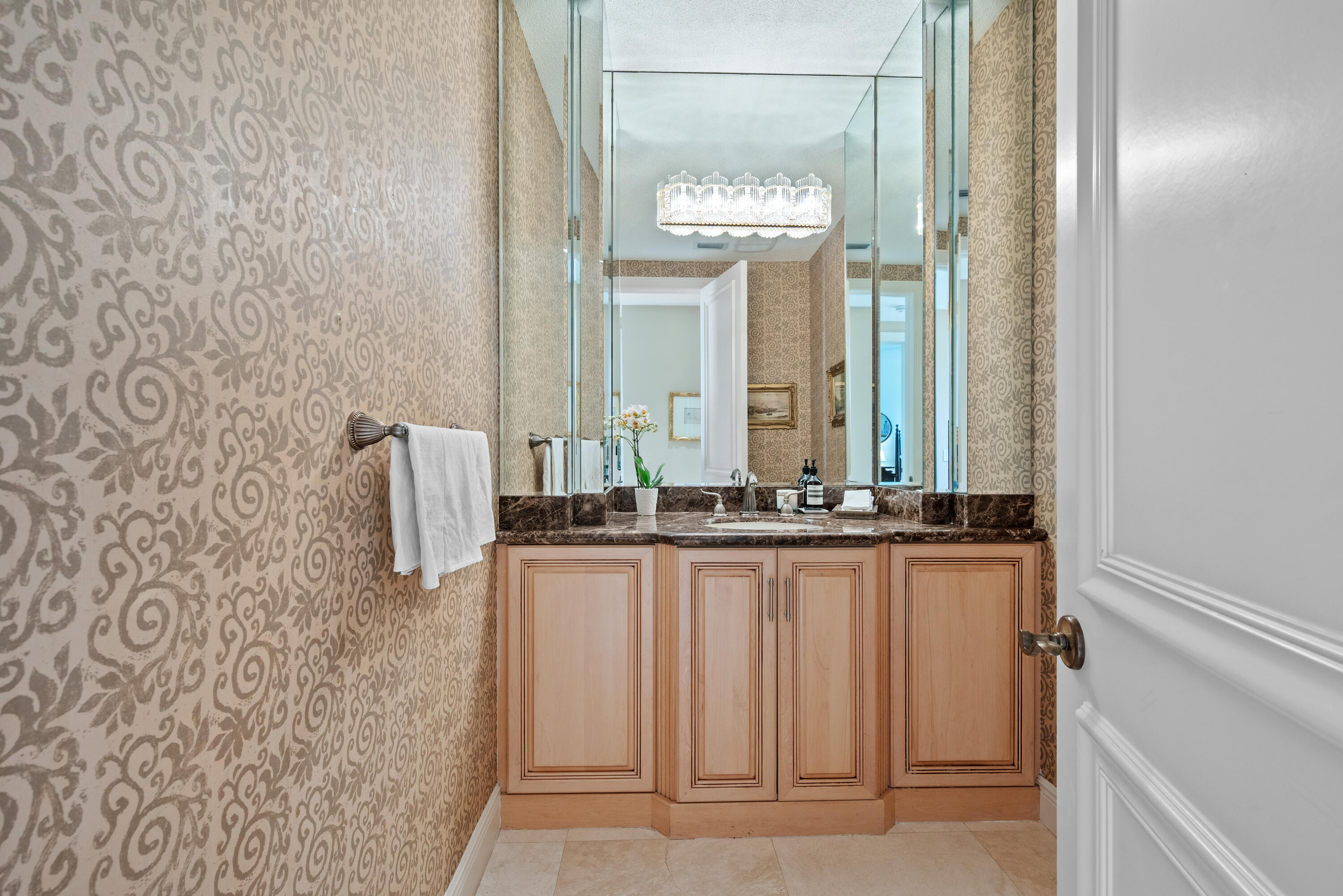 18800 Long Lake Drive Boca Raton, FL 33496 - Photo 30 of 60 a bathroom with a granite countertop sink and a mirror