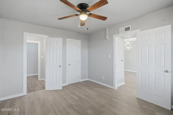 a view of an empty room with a window