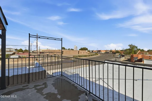 a view of a hallway with a glass door