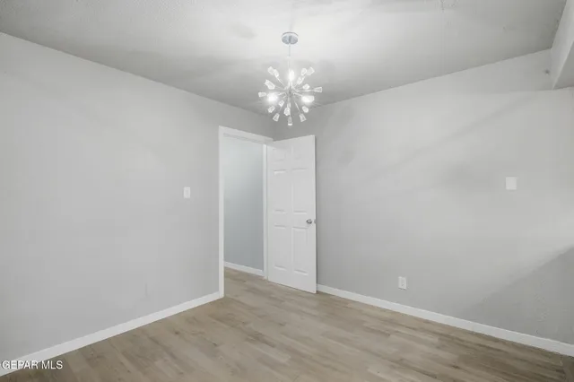 an empty room with cabinet