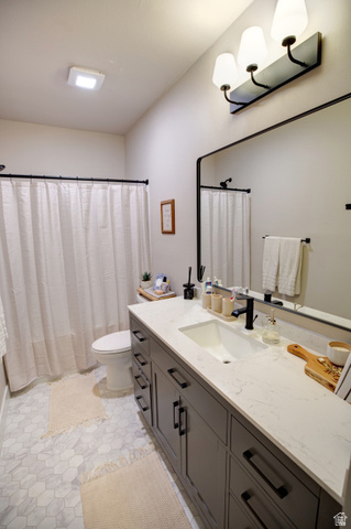 983 South 950 West Provo, UT 84601 - Photo 34 of 56 Modern vanity featuring a quartz countertop and integrated sink