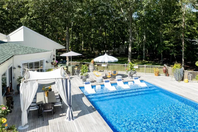 a view of house with patio outdoor seating