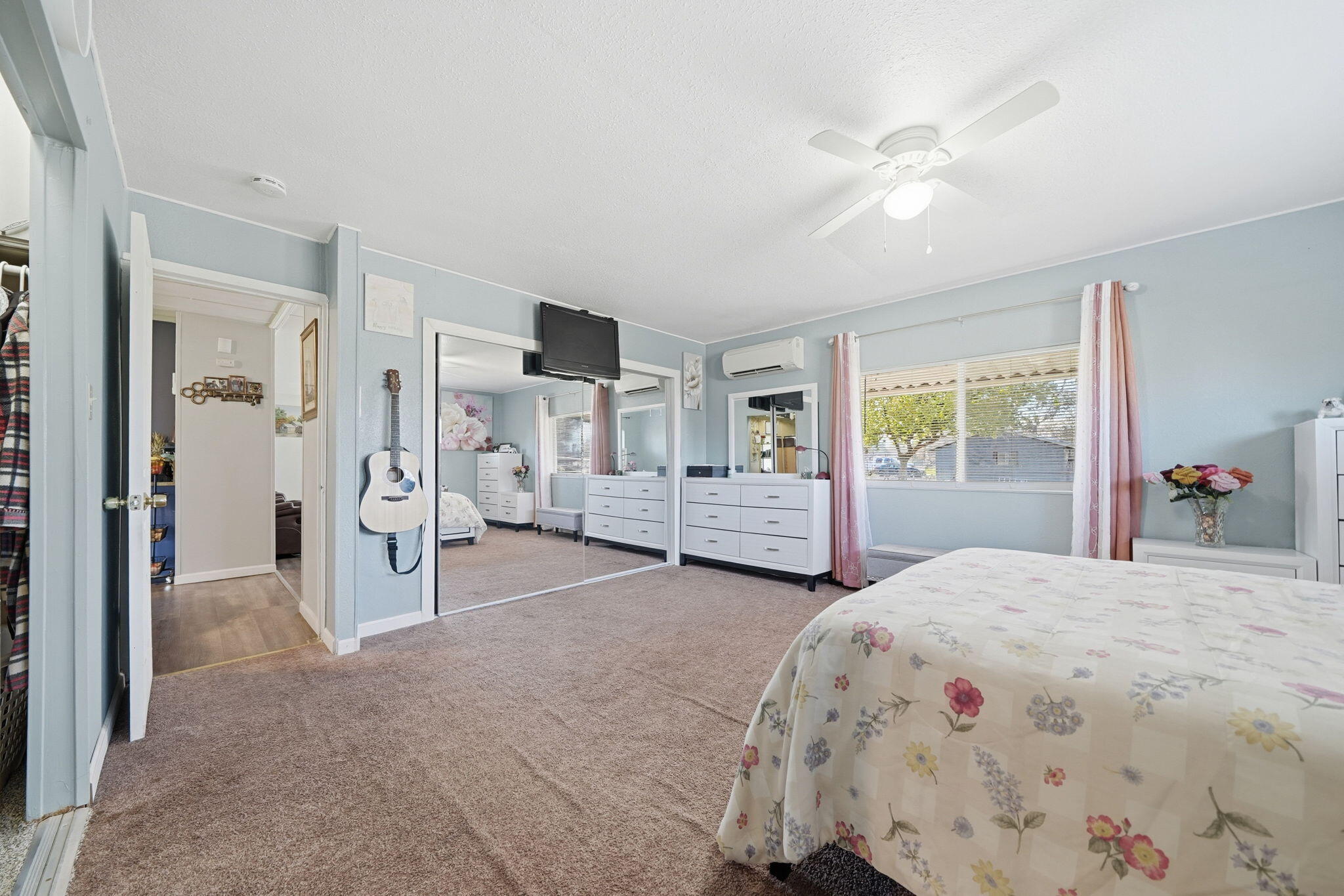 17300 Lassen Avenue Anderson, CA 96007 - Photo 12 of 34 a spacious bedroom with a bed and a view of en suite bathroom
