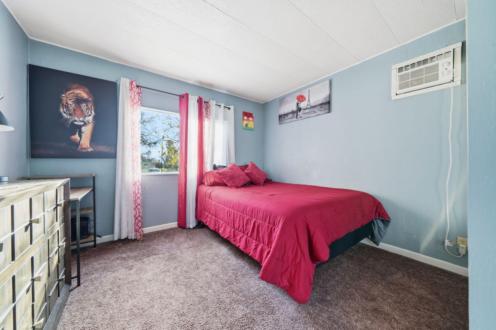 17300 Lassen Avenue Anderson, CA 96007 - Photo 16 of 34 a bedroom with a bed and a storage