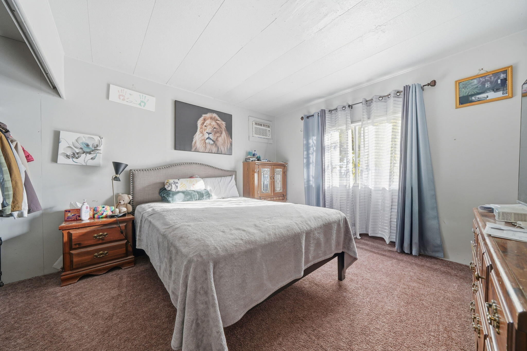 17300 Lassen Avenue Anderson, CA 96007 - Photo 17 of 34 a spacious bedroom with a bed and a dresser