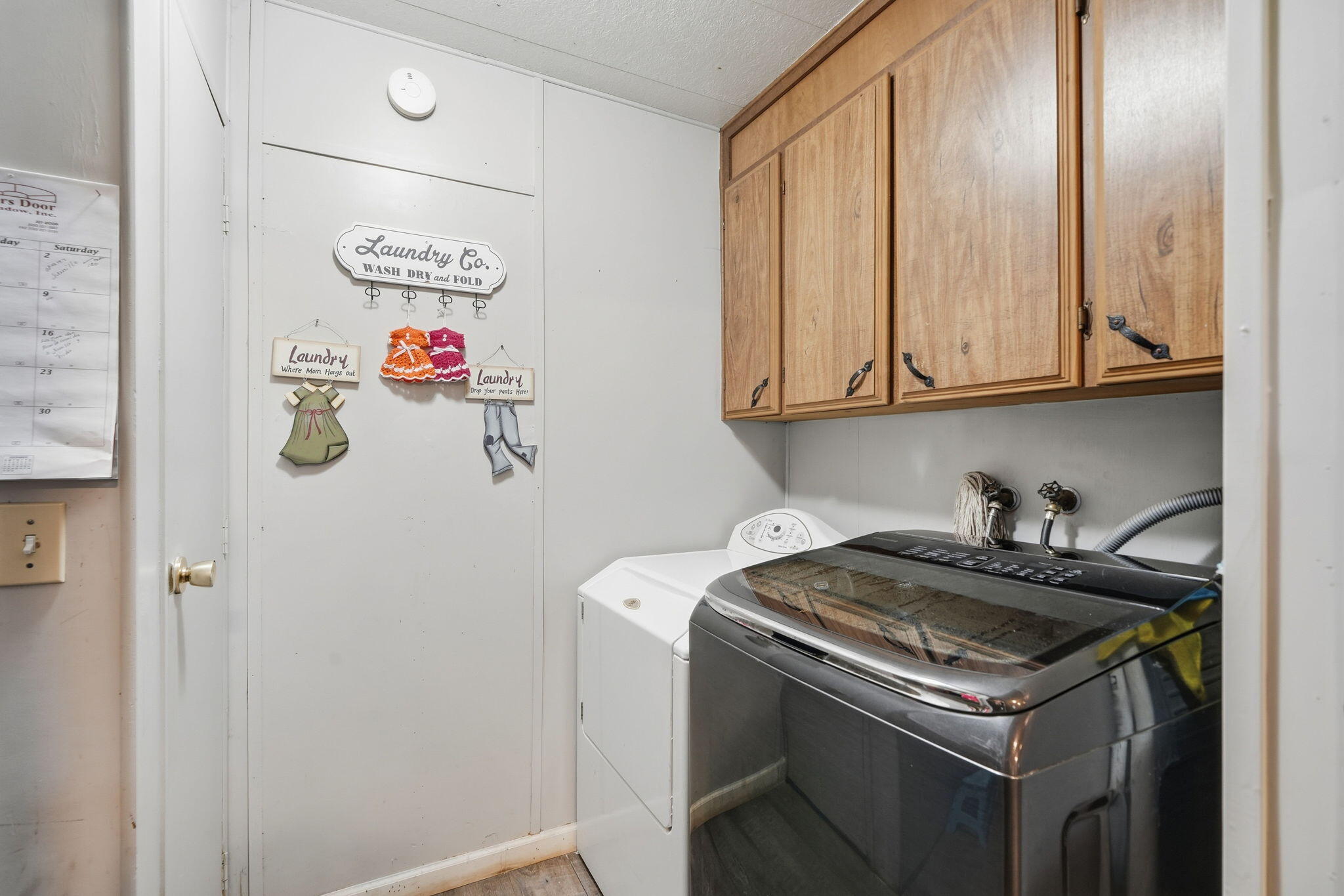 17300 Lassen Avenue Anderson, CA 96007 - Photo 19 of 34 a utility room with dryer and washer