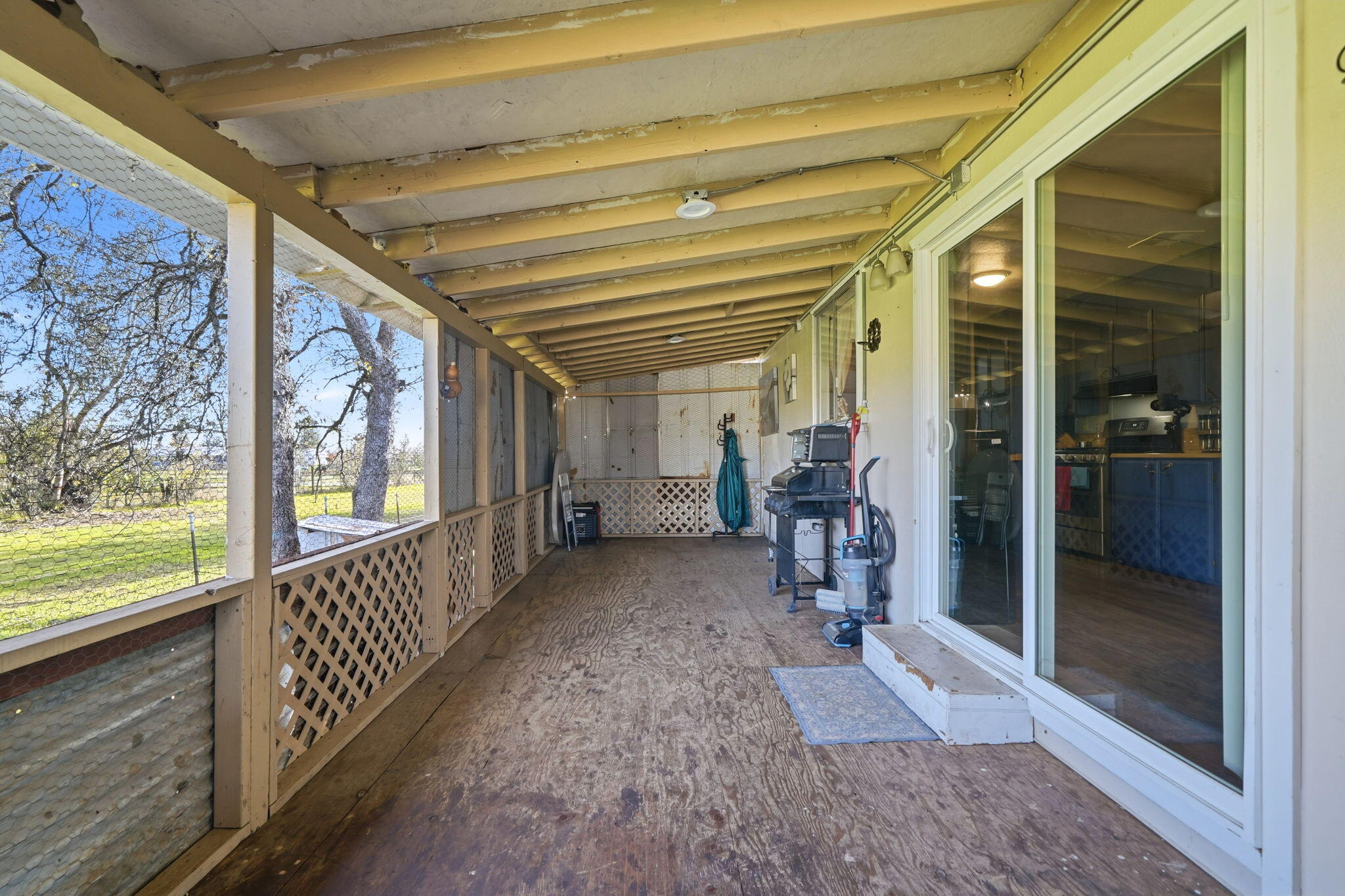 17300 Lassen Avenue Anderson, CA 96007 - Photo 20 of 34 a view of a hallway with wooden floor and windows