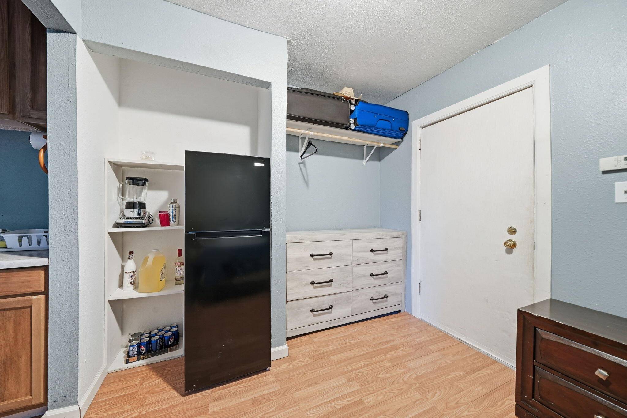 17300 Lassen Avenue Anderson, CA 96007 - Photo 25 of 34 a kitchen with a refrigerator and cabinets