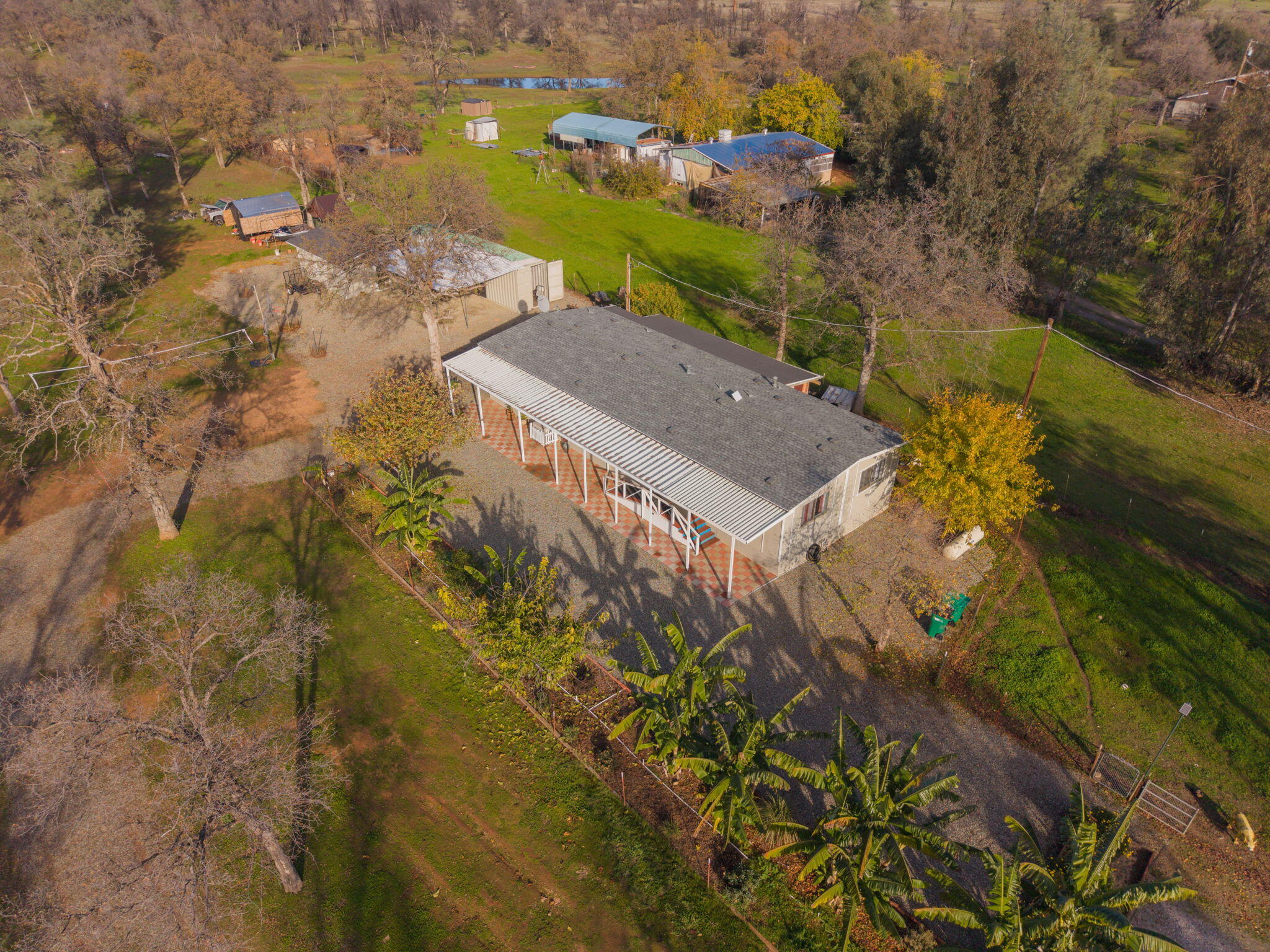 17300 Lassen Avenue Anderson, CA 96007 - Photo 32 of 34 an aerial view of residential houses with outdoor space