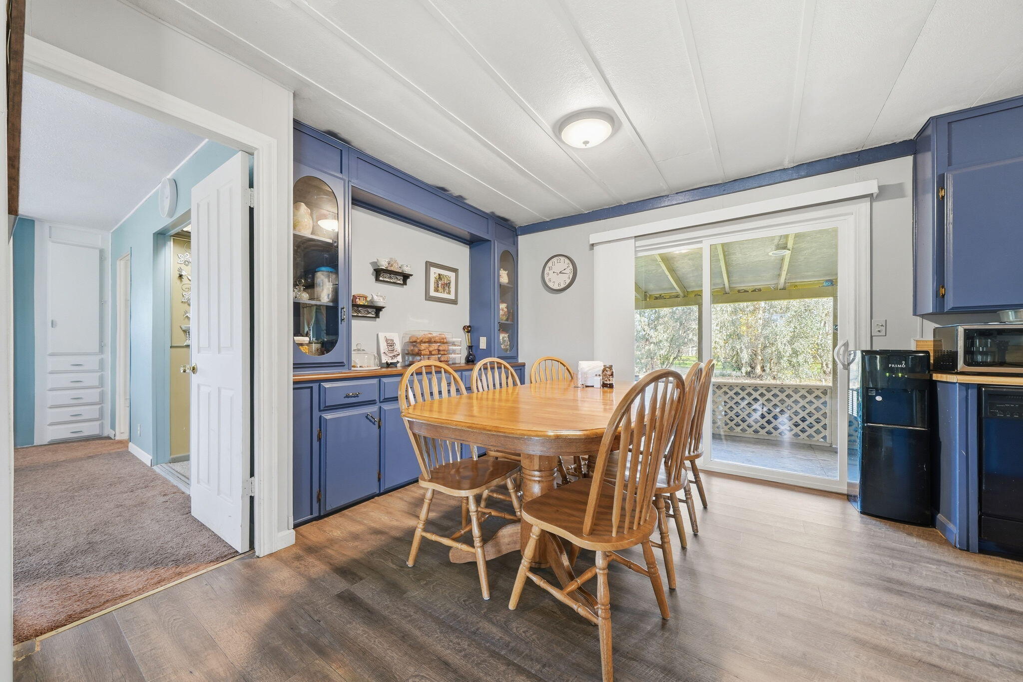 17300 Lassen Avenue Anderson, CA 96007 - Photo 10 of 34 a dining room with furniture window wooden floor