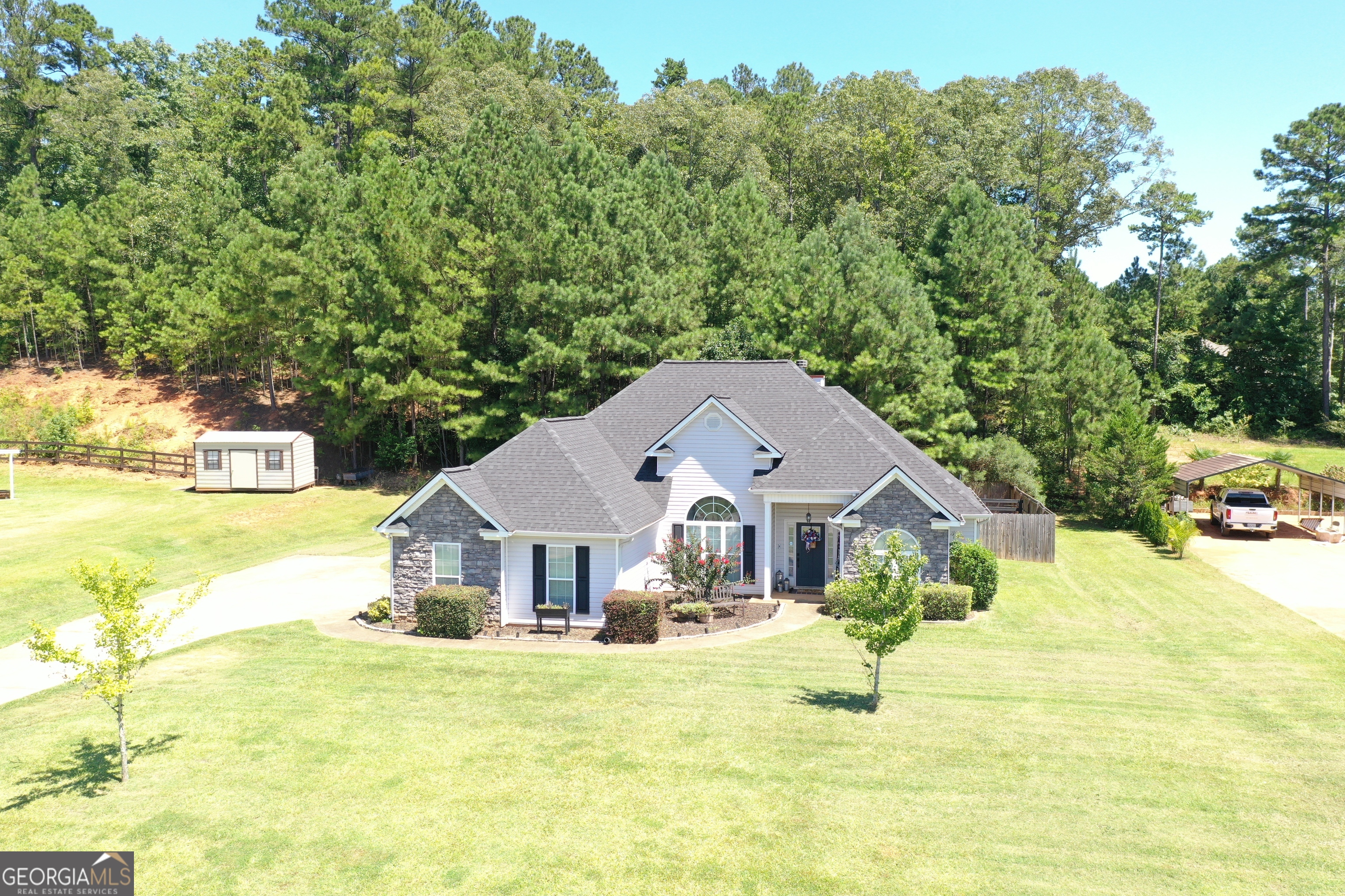 229 John Lovelace Road LaGrange, GA 30241 - Photo 51 of 59 a front view of a house with a yard