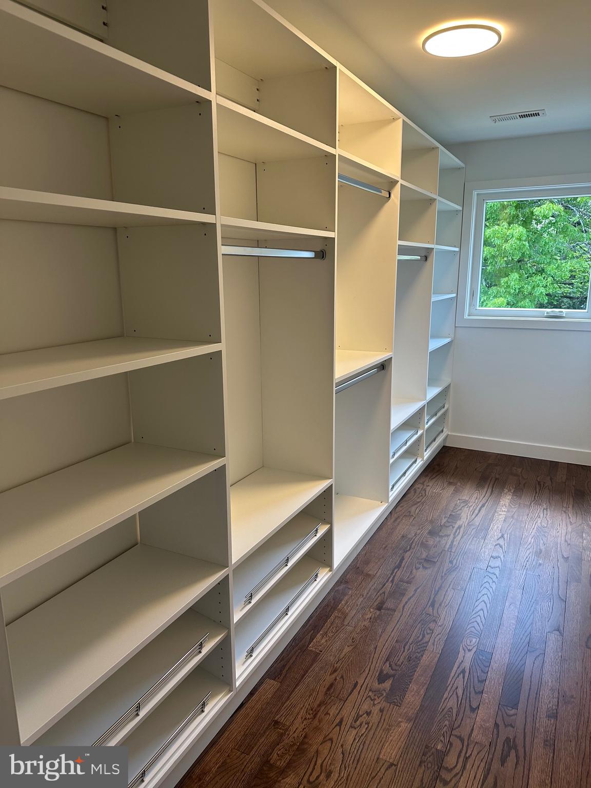 713 Woodfield Road Villanova, PA 19085 - Photo 16 of 36 a view of walk in closet with empty racks