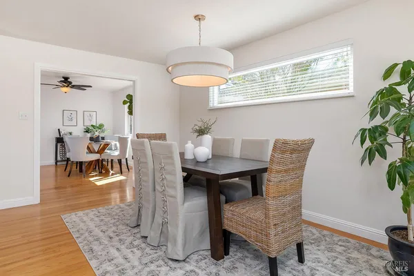 a view of a dining room with furniture