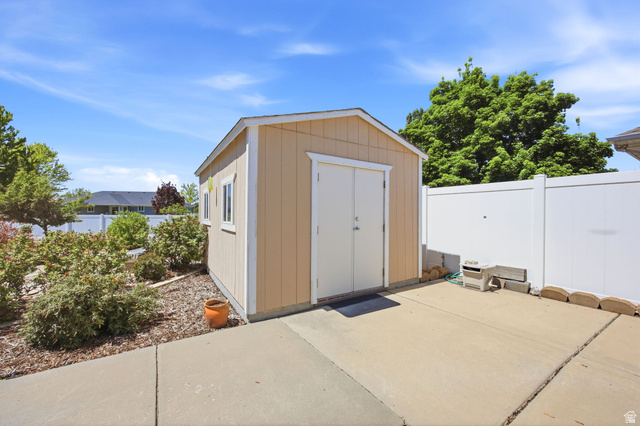 776 Flint Street Layton, UT 84041 - Photo 26 of 41 Freestanding storage shed with dual access doors and two side windows