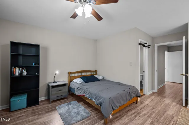 a bedroom with a bed and a walk in closet