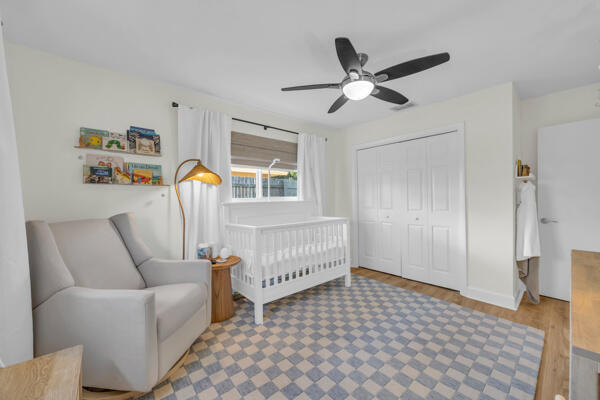 102 Pineview Road Jupiter, FL 33469 - Photo 26 of 34 a living room with furniture and a rug