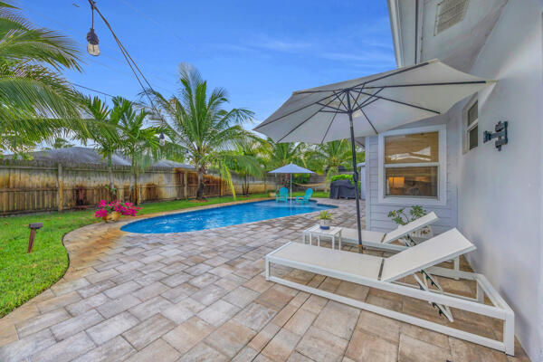 102 Pineview Road Jupiter, FL 33469 - Photo 29 of 34 a view of outdoor space yard and patio