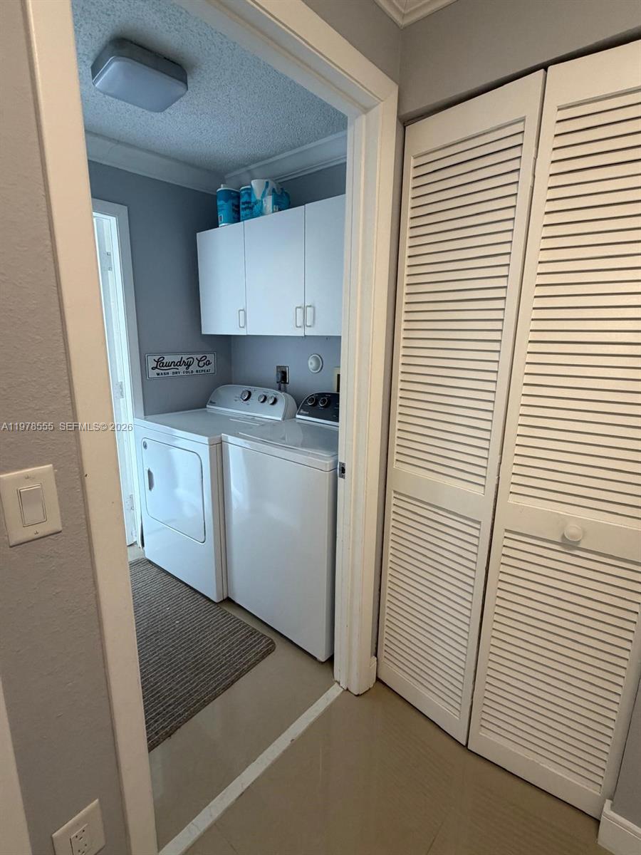 10285 Allegro Drive Boca Raton, FL 33428 - Photo 38 of 55 a kitchen with a sink and cabinets