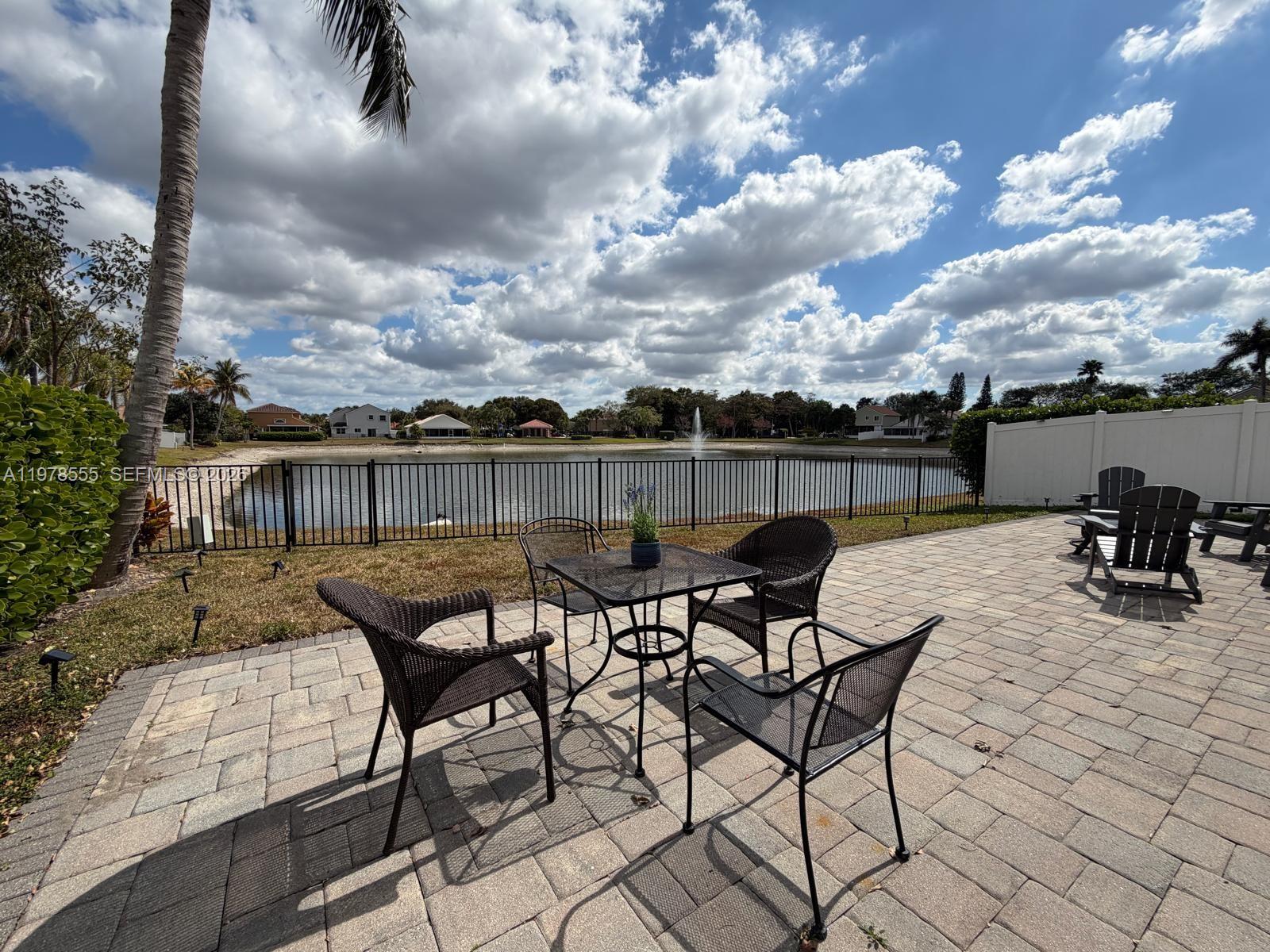 10285 Allegro Drive Boca Raton, FL 33428 - Photo 42 of 55 a view of a terrace with furniture