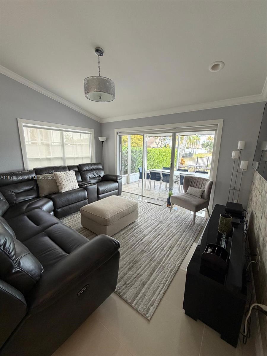 10285 Allegro Drive Boca Raton, FL 33428 - Photo 55 of 55 a living room with furniture and a large window