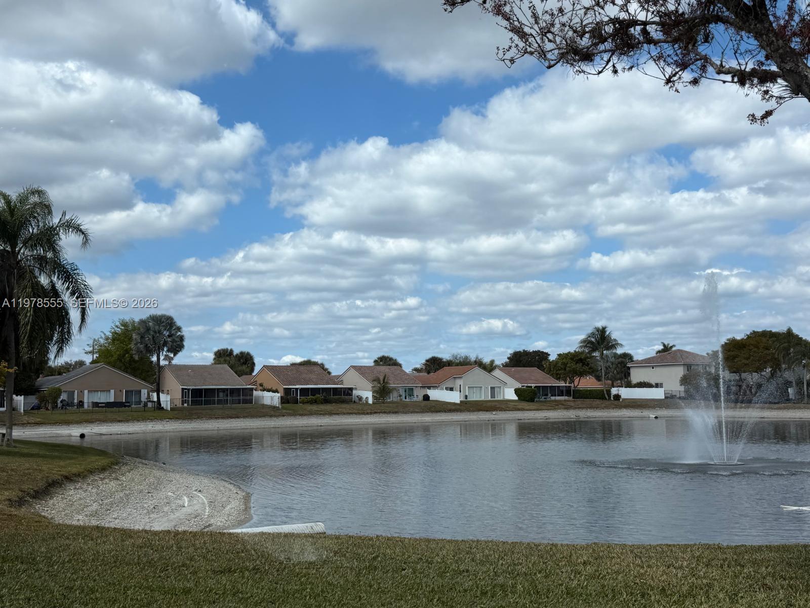 10285 Allegro Drive Boca Raton, FL 33428 - Photo 10 of 55 a view of a lake with houses