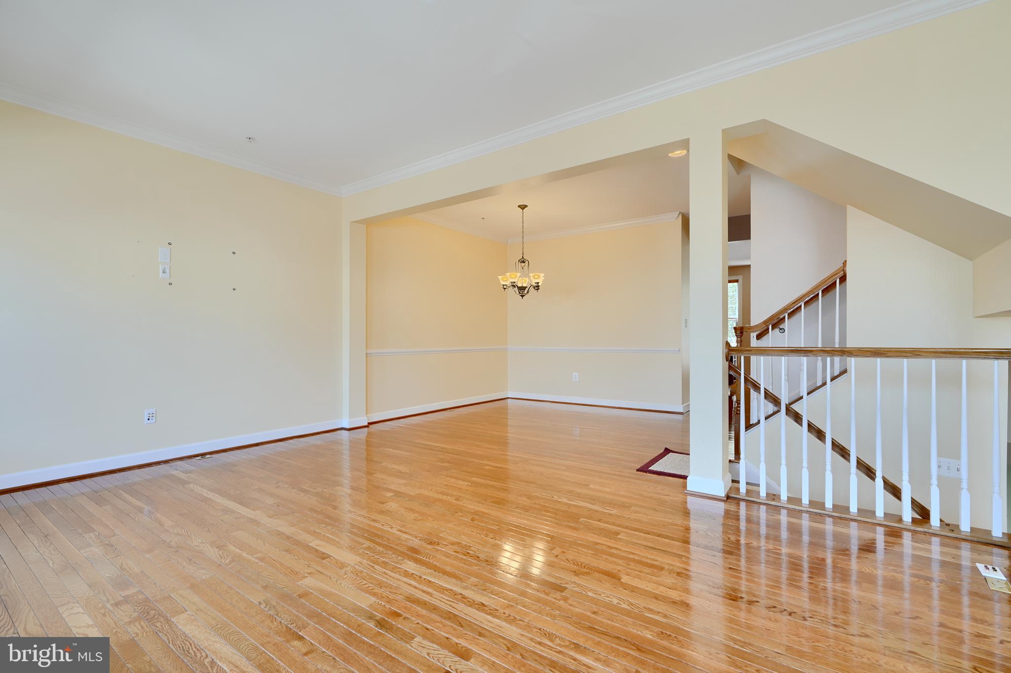 7570 Maidenhead Drive Hanover, MD 21076 - Photo 11 of 37 a view of an empty room with wooden floor
