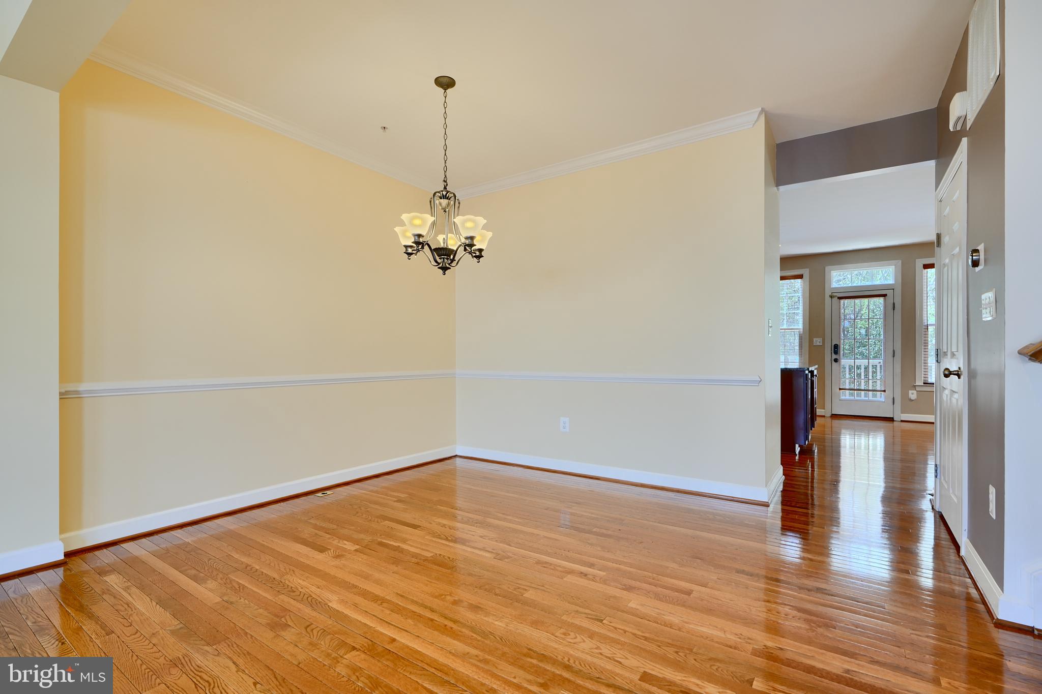 7570 Maidenhead Drive Hanover, MD 21076 - Photo 12 of 37 a view of empty room with wooden floor