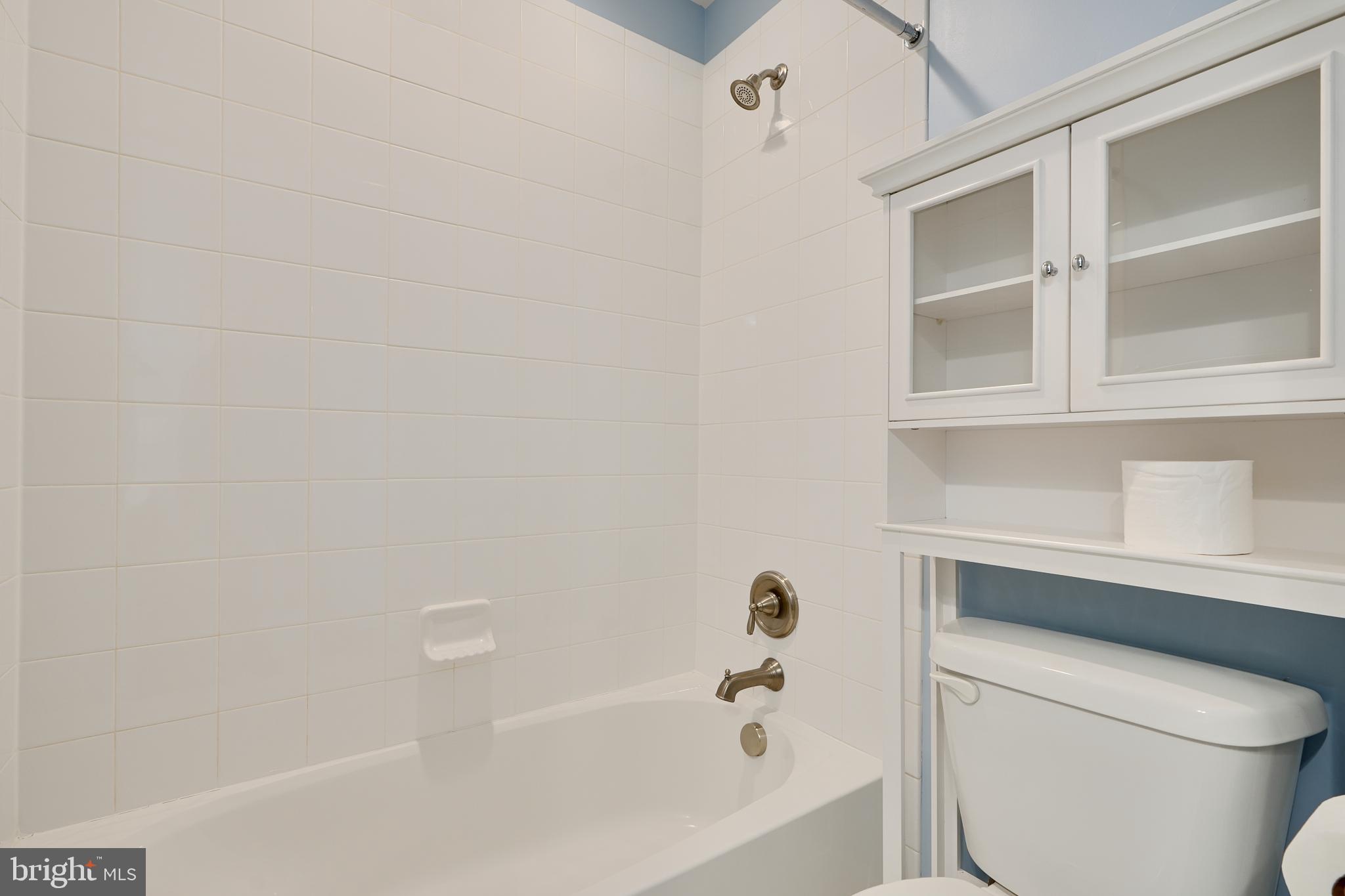 7570 Maidenhead Drive Hanover, MD 21076 - Photo 27 of 37 a bathroom with a bathtub and a toilet