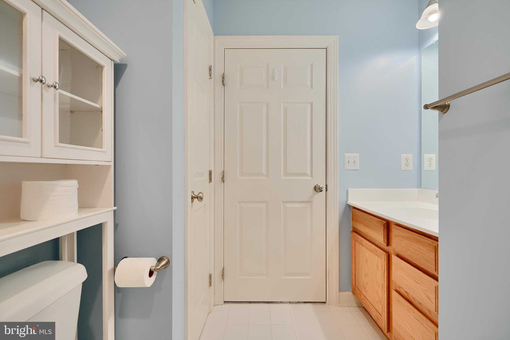 7570 Maidenhead Drive Hanover, MD 21076 - Photo 28 of 37 a bathroom with a granite countertop sink toilet and shower
