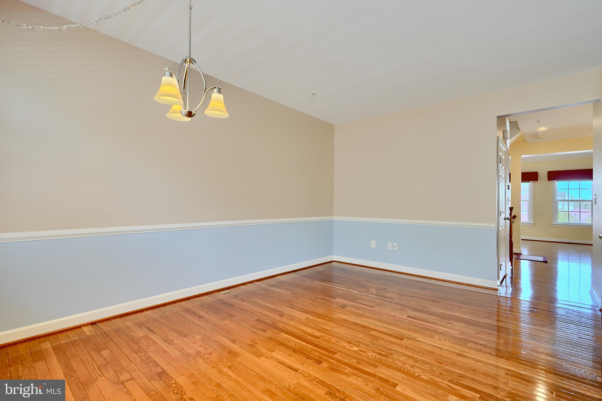 7570 Maidenhead Drive Hanover, MD 21076 - Photo 9 of 37 a view of empty room with wooden floor