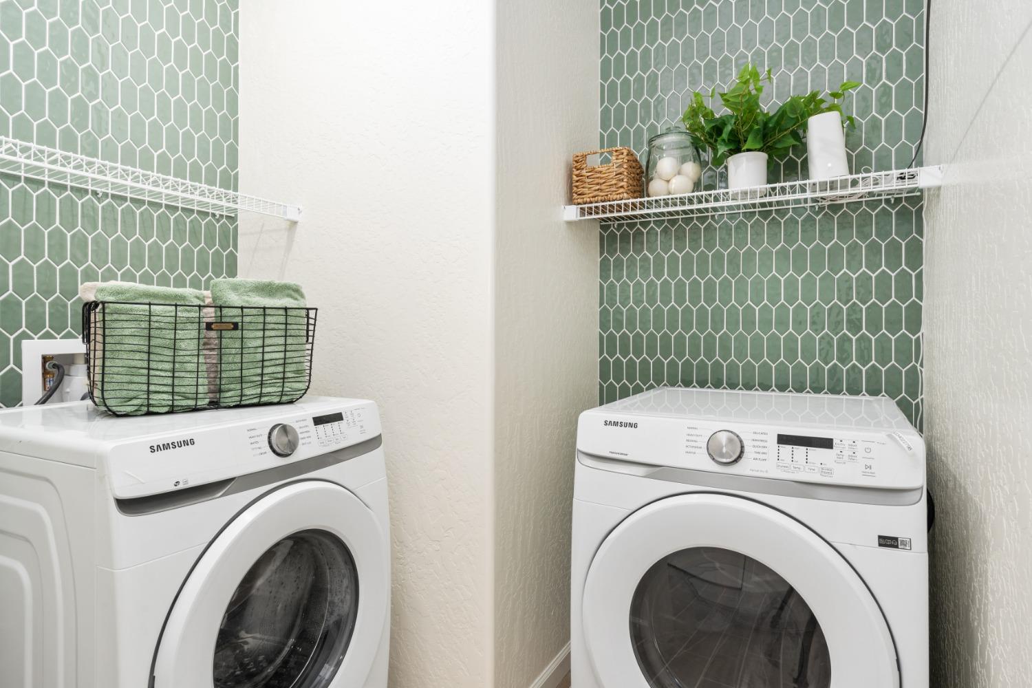 1609 Bloom Avenue Clovis, CA 93619 - Photo 23 of 23 a utility room with dryer and washer