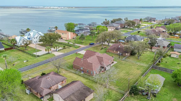 an aerial view of a house with a garden