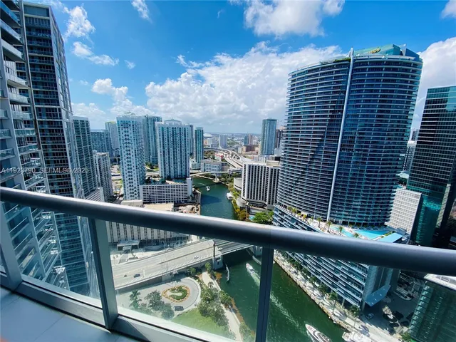 a view of balcony with furniture