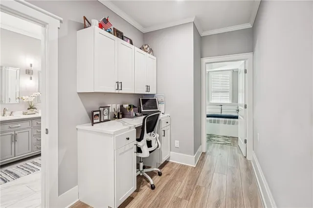 a view of a house with a backyard and a patio