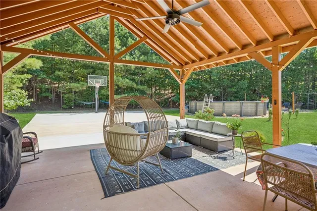 an aerial view of a house with outdoor space and street view