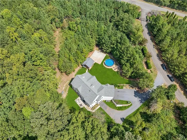 $998,000 | 60 Cove Lake Drive, Marble Hill, GA 30148