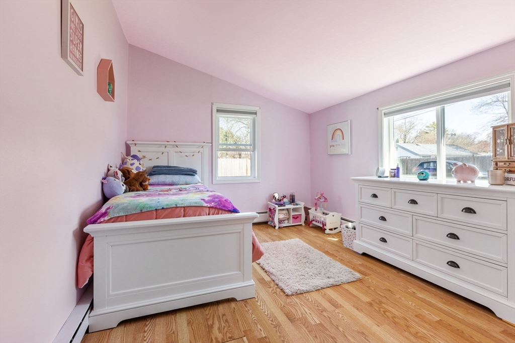 11 Mayflower Road Norton, MA 02766 - Photo 11 of 22 a room with a dresser and a window