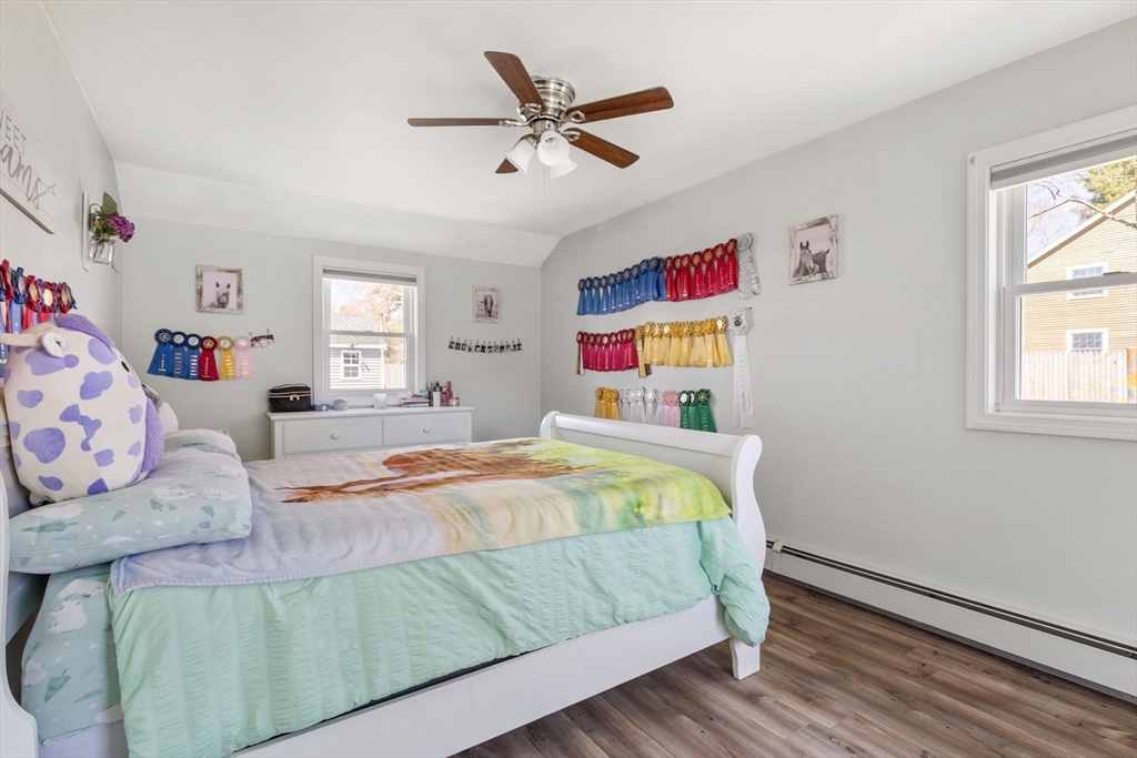 11 Mayflower Road Norton, MA 02766 - Photo 12 of 22 a bedroom with a bed and window