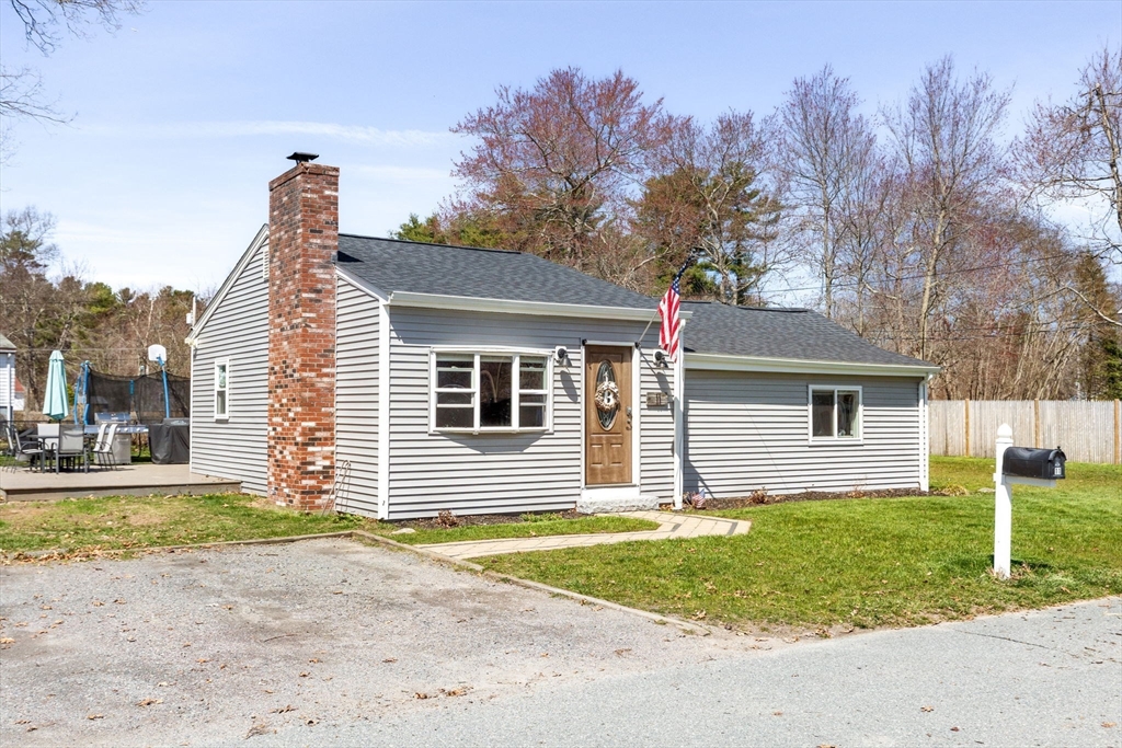 11 Mayflower Road Norton, MA 02766 - Photo 2 of 22 a view of a house with a yard